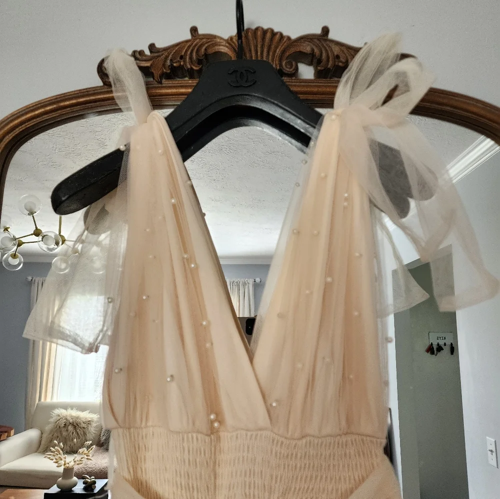 Ivorie Kai size medium